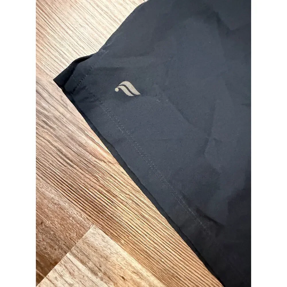 Fabletics Fundamental shorts mens size 34/M in black lined 9in inseam EUC